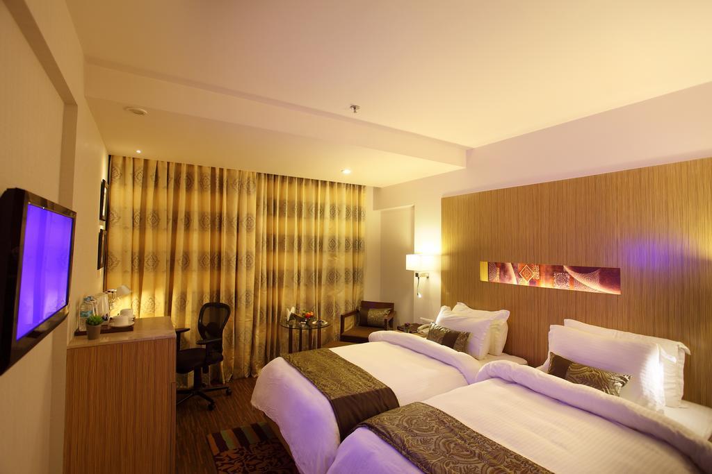 ראג'קוט Comfort Inn Legacy חדר תמונה